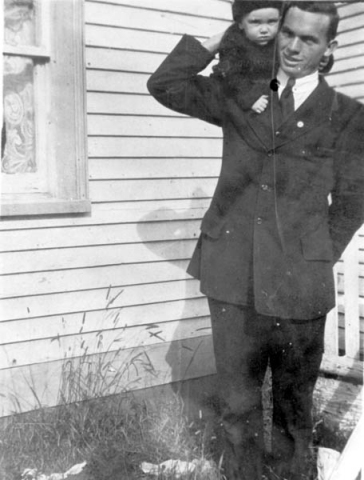 329: "Dear Aunt Millus, this is me and Uncle Tom D- in front of our house". Tom Dunphy holding baby Vince McCarthy. (1920)  - Tom son of Patrick Dunphy &amp;amp; Anastasia Fitzgerald, married Anastasia Carroll; Vince son of James McCarthy &amp;amp; Julia Reddy